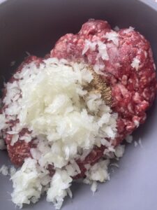 squeezed onions added to mince