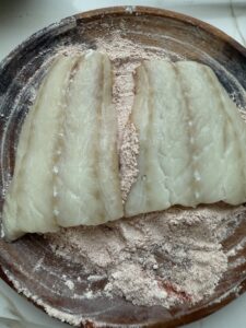 fish fillets wrapped in flour mixture